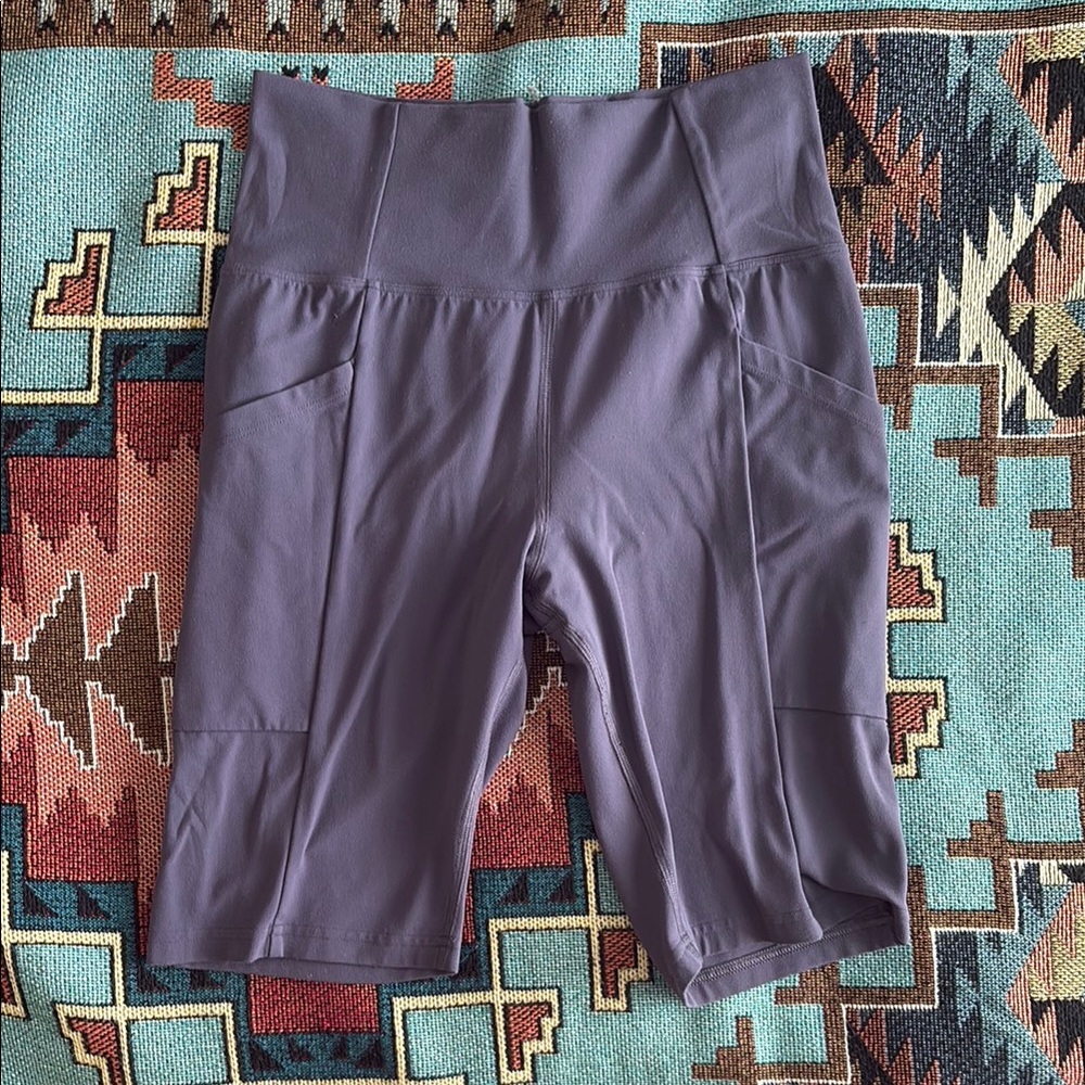 REI purple biker shorts medium